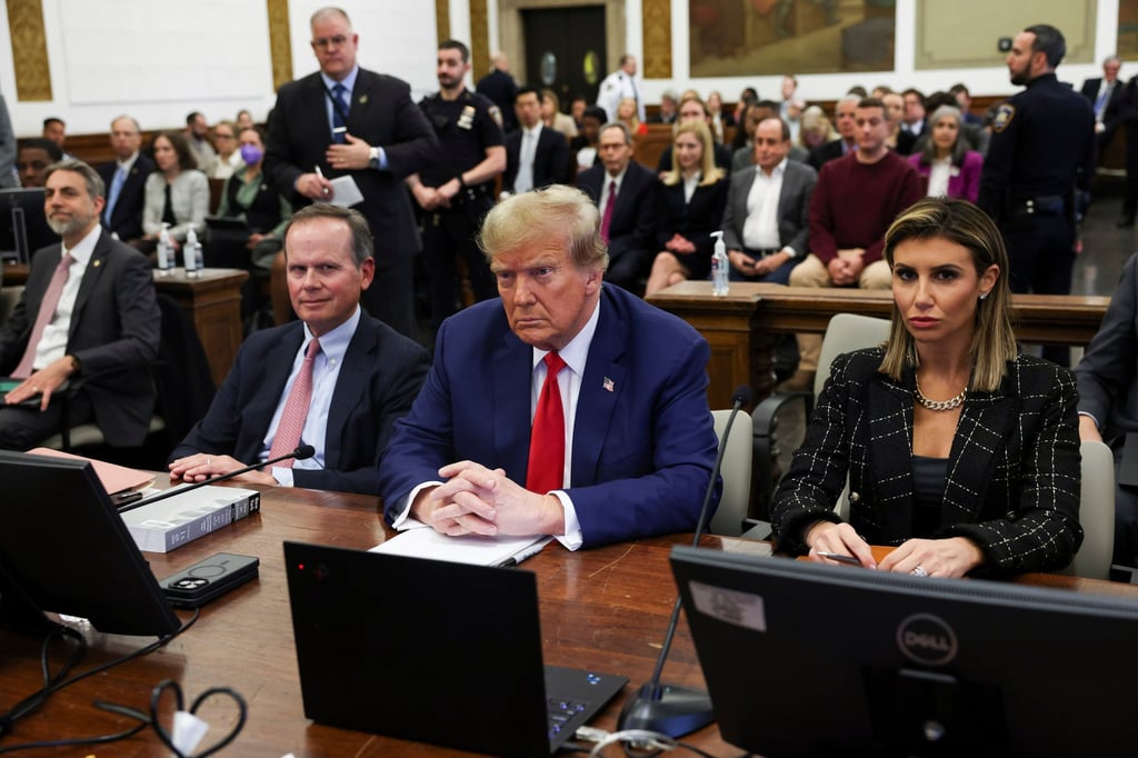 Alina Habba (front, right) appears with Donald Trump (centre) and fellow lawyer Christopher Kise during closing arguments in the Trump Organisation civil fraud trial in New York in January 2024. Photo: AP Alina Habba (front, right) appears with Donald Trump (centre) and fellow lawyer Christopher Kise during closing arguments in the Trump Organisation civil fraud trial in New York in January 2024. Photo: AP