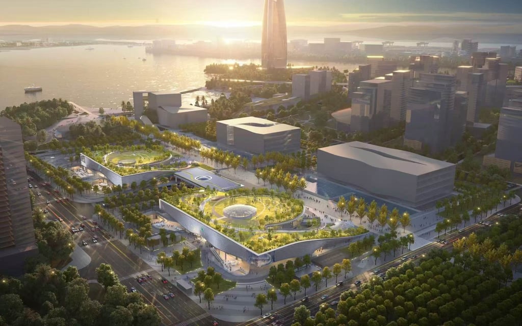 A rendering of the Eyes of the GBA – a multi-storey bookshop and cultural complex which includes a rooftop garden – has been designed in the shape of twin jade discs. A rendering of the Eyes of the GBA – a multi-storey bookshop and cultural complex which includes a rooftop garden – has been designed in the shape of twin jade discs.