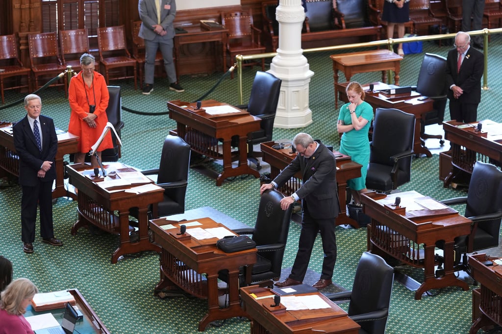 Texas state senators pray before they debate a bill on a redrawn US congressional map during a special session at the Texas Capitol in Austin, Texas on Friday. Photo: AP Texas state senators pray before they debate a bill on a redrawn US congressional map during a special session at the Texas Capitol in Austin, Texas on Friday. Photo: AP