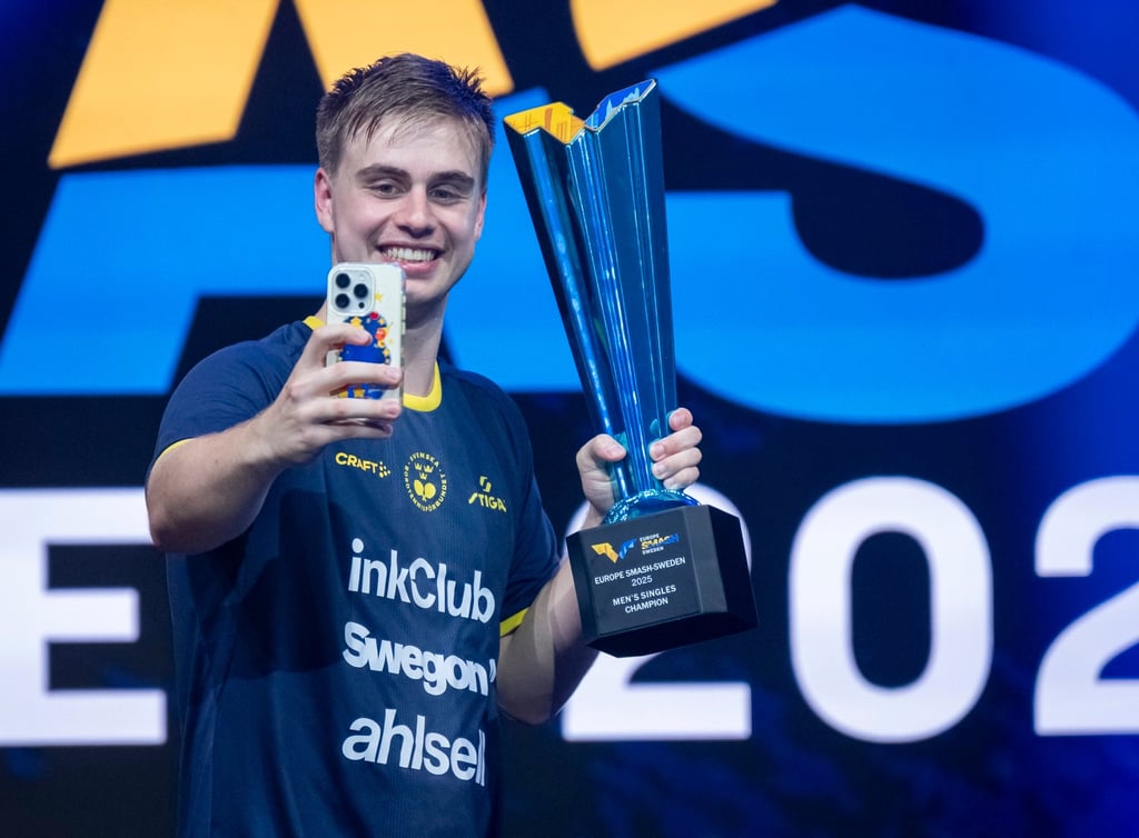 Sweden’s Truls Moregard takes a selfie with the men’s singles trophy in Malmo. Photo: EPA Sweden’s Truls Moregard takes a selfie with the men’s singles trophy in Malmo. Photo: EPA