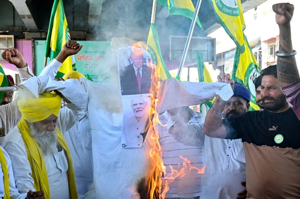 Farmers burn an effigy of US President Donald Trump and Indian Prime Minister Narendra Modi during a protest in Amritsar, India on April 4. Photo: AFP Farmers burn an effigy of US President Donald Trump and Indian Prime Minister Narendra Modi during a protest in Amritsar, India on April 4. Photo: AFP