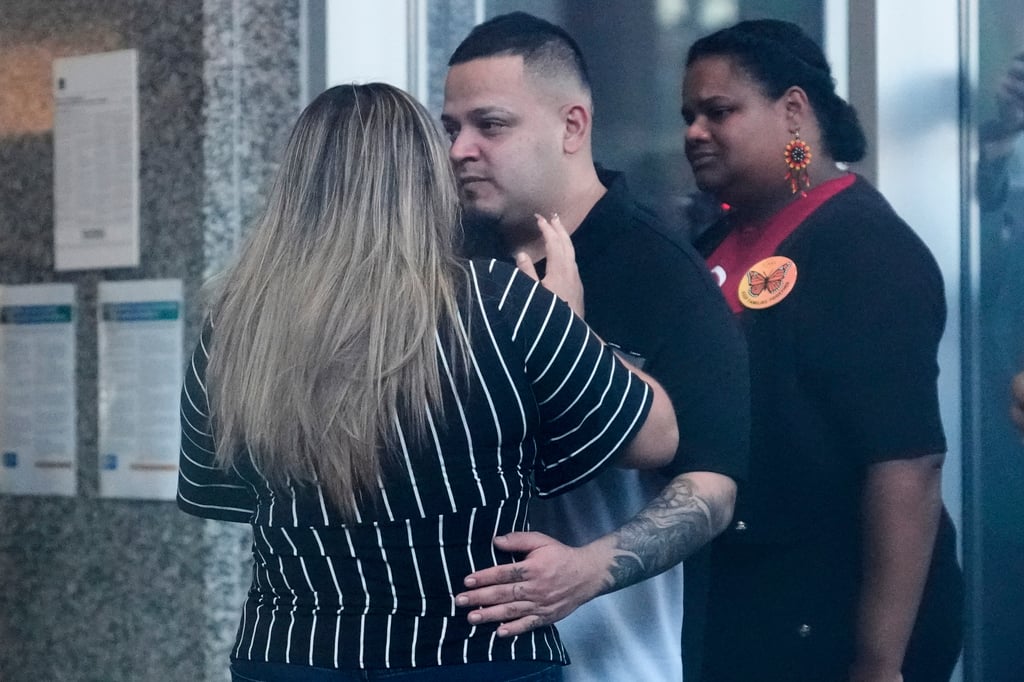 Jennifer Vasquez Sura (left) hugs her husband Kilmar Abrego Garcia at the ICE field office in Baltimore on Monday. Photo: AP Jennifer Vasquez Sura (left) hugs her husband Kilmar Abrego Garcia at the ICE field office in Baltimore on Monday. Photo: AP