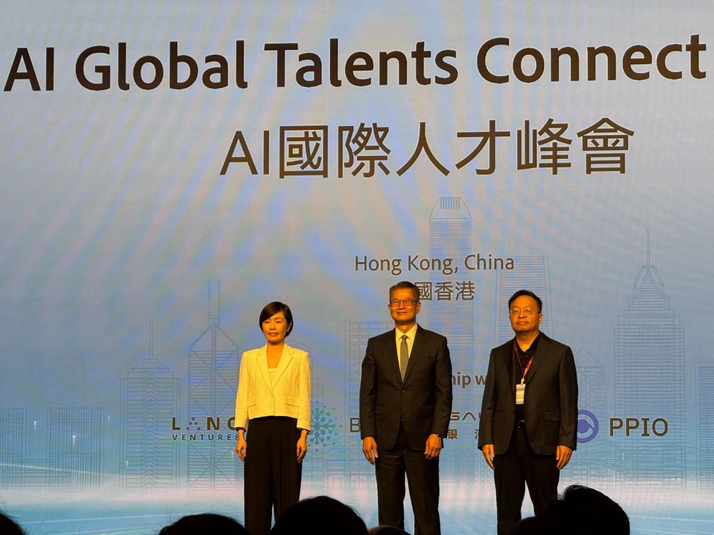 HKIC CEO Clara Chan Ka-chai, Hong Kong Financial Secretary Paul Chan Mo-po and BAAI chairman Huang Tiejun attend an event announcing the inaugural AI Global Talents Connect initiative on Tuesday. Photo: Xinmei Shen