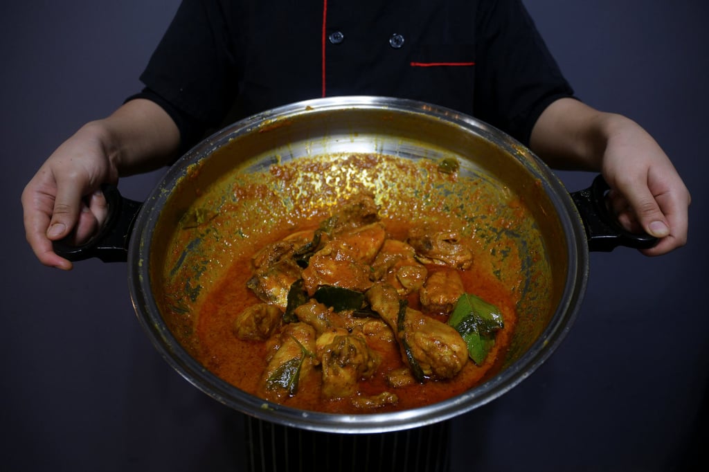 A pot of chicken rendang, a Malaysian curry dish. Photo: Reuters