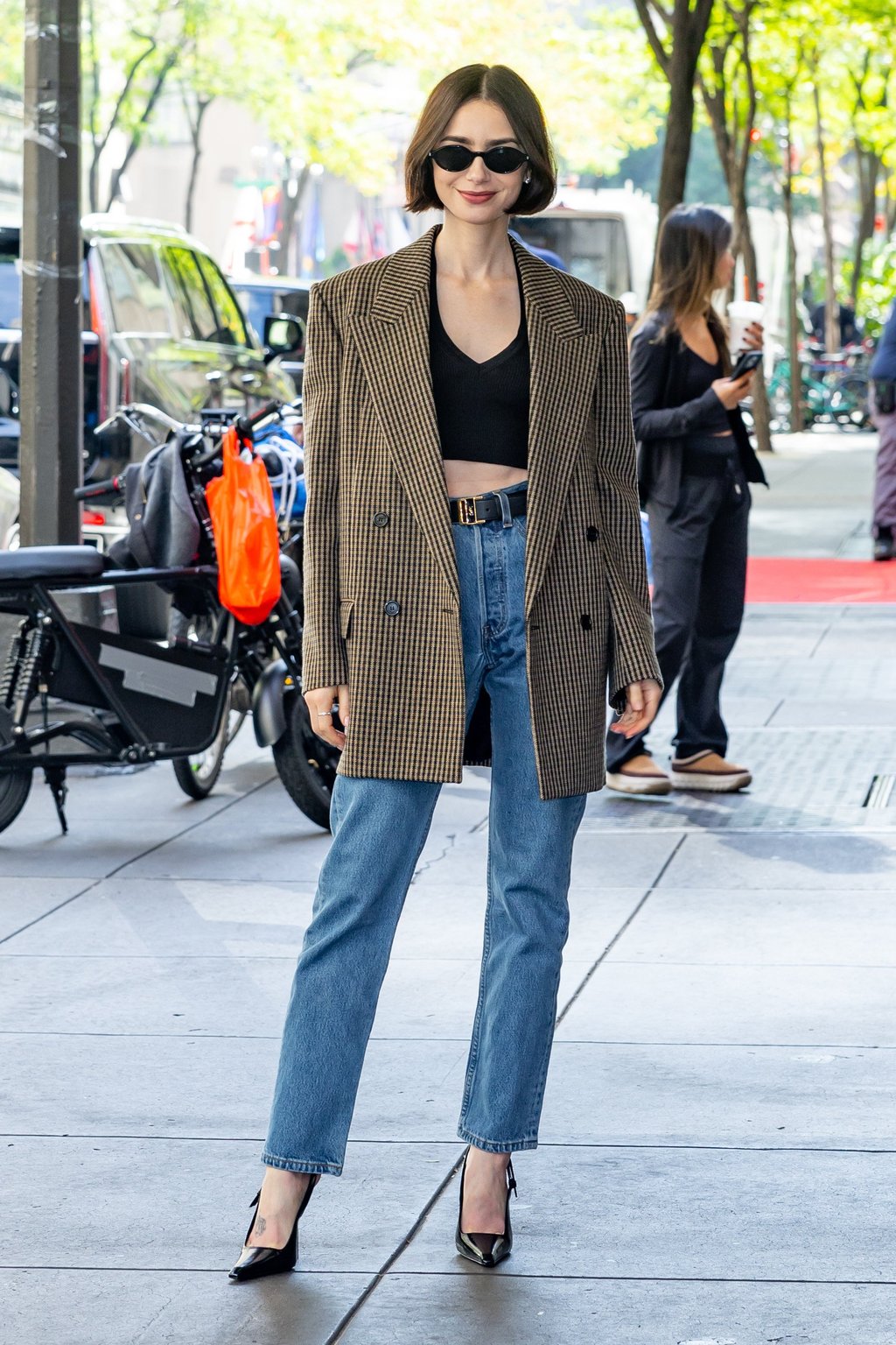 Lily Collins wears Saint Laurent in New York last September. Photo: The Hapa Blonde/GC Images