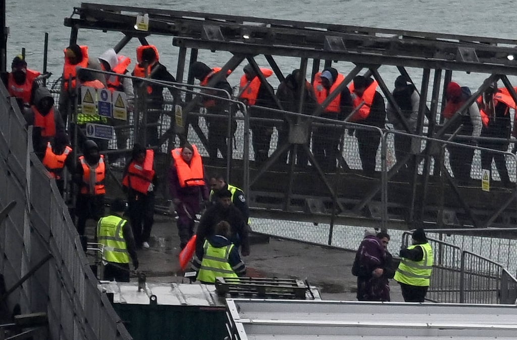 Migrants picked up at sea while attempting to cross the English Channel from France. Photo: AFP Migrants picked up at sea while attempting to cross the English Channel from France. Photo: AFP