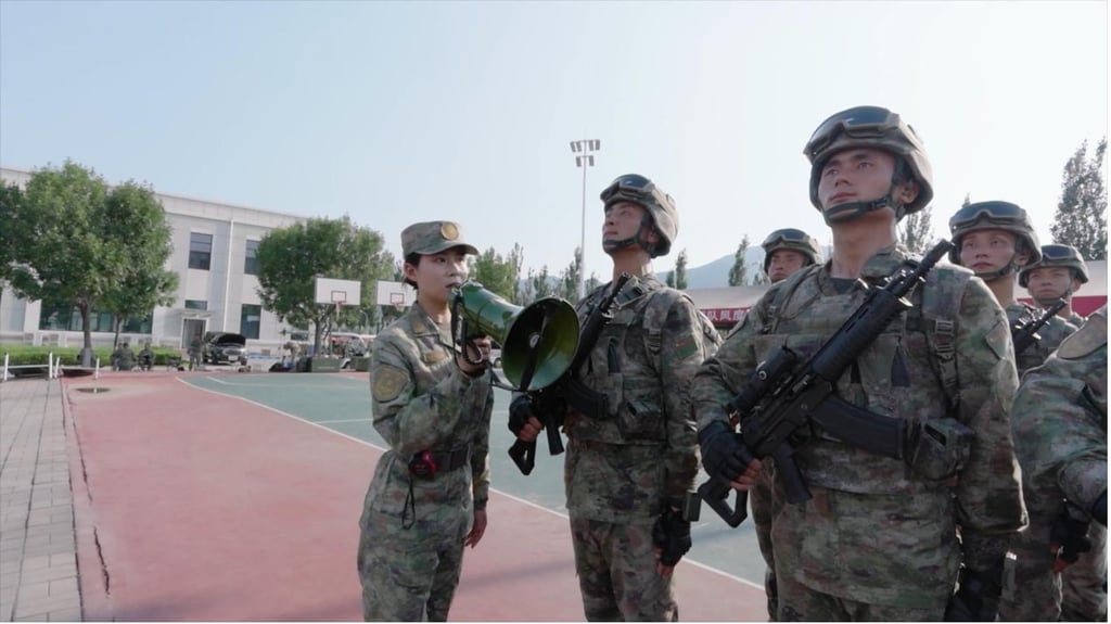 Keeping them in line: When Wang speaks, the men under her command listen. Photo: shobserver Keeping them in line: When Wang speaks, the men under her command listen. Photo: shobserver