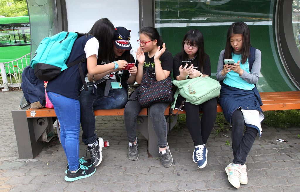 Surveys show 98 per cent of South Koreans own a smartphone. Photo: AP Surveys show 98 per cent of South Koreans own a smartphone. Photo: AP