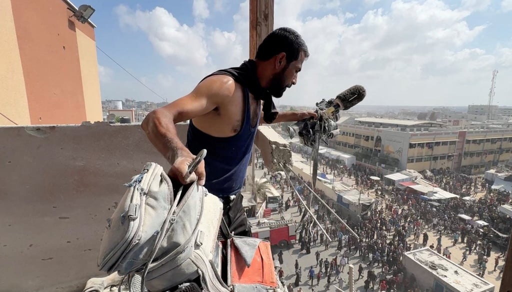 A man holds the equipment used by Palestinian cameraman Hussam al-Masri. Photo: Reuters