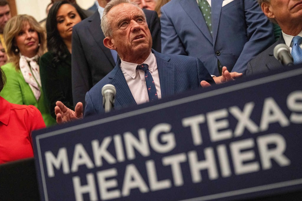 US Secretary of Health and Human Services Robert F. Kennedy Jnr joins Governor Greg Abbott as he signs Make Texas Healthy Again legislation at the Capitol in Austin, Texas, on Wednesday. Photo: Austin American-Statesman via AP