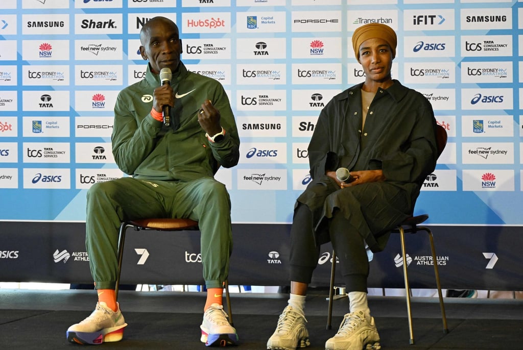 Elite marathon athletes Kenyan Eliud Kipchoge (left) and Sifan Hassan, from the Netherlands, will both be racing in Sydney this weekend. Photo: AFP Elite marathon athletes Kenyan Eliud Kipchoge (left) and Sifan Hassan, from the Netherlands, will both be racing in Sydney this weekend. Photo: AFP