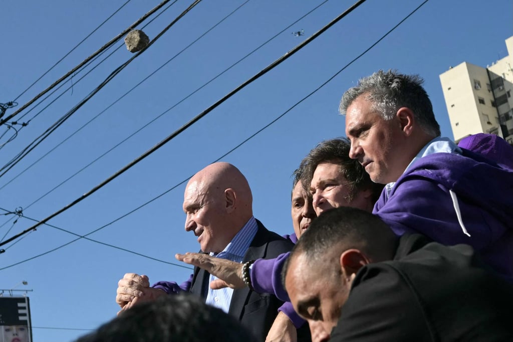 A stone flying through the air near Argentina’s President Javier Milei. Photo: AFP A stone flying through the air near Argentina’s President Javier Milei. Photo: AFP
