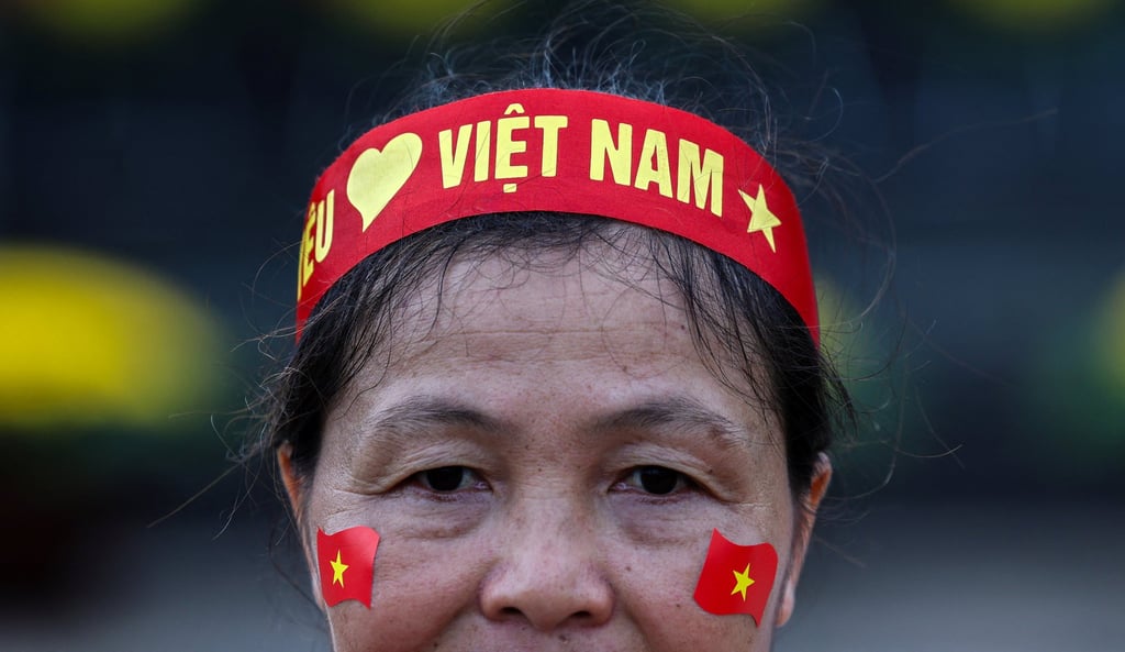 A woman wearing a headband with ‘Vietnam’ written on it poses at Ho Chi Minh’s Mausoleum in Ba Dinh Square, ahead of Independence Day celebrations in Hanoi, Vietnam, last month. Photo: Reuters A woman wearing a headband with ‘Vietnam’ written on it poses at Ho Chi Minh’s Mausoleum in Ba Dinh Square, ahead of Independence Day celebrations in Hanoi, Vietnam, last month. Photo: Reuters