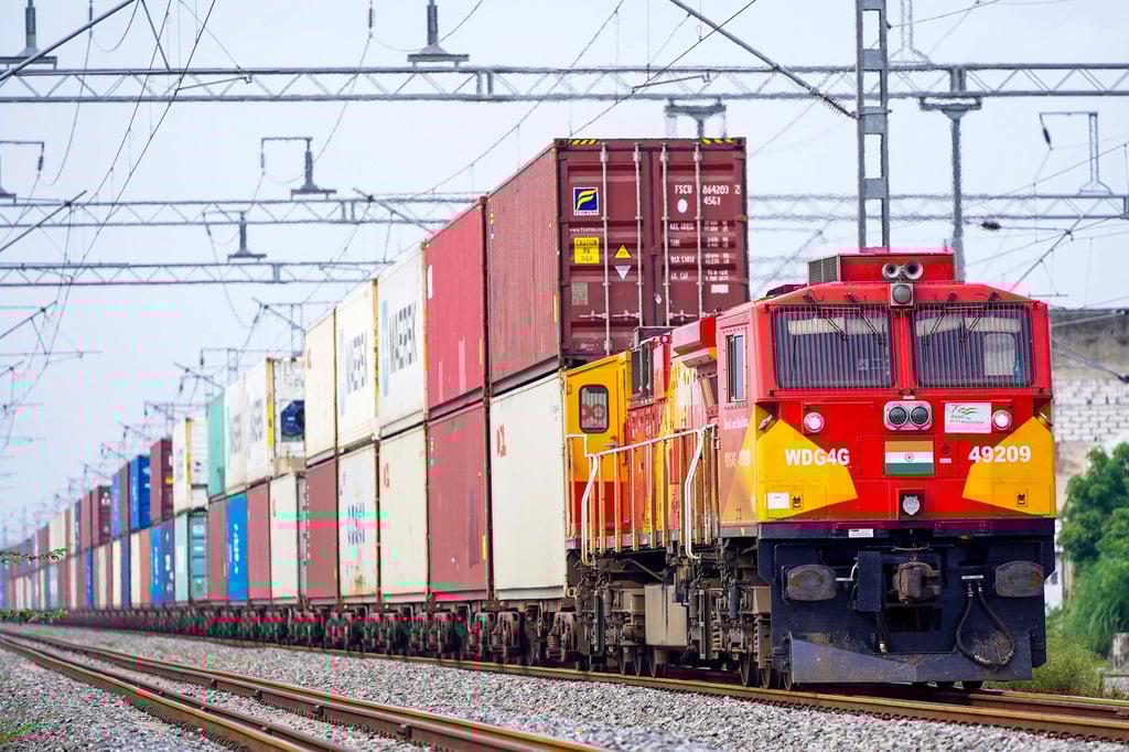 A freight train carrying cargo containers rides along a railway track in Ajmer last month. India posted 7.8 per cent growth in the April–June quarter. Photo: TNS