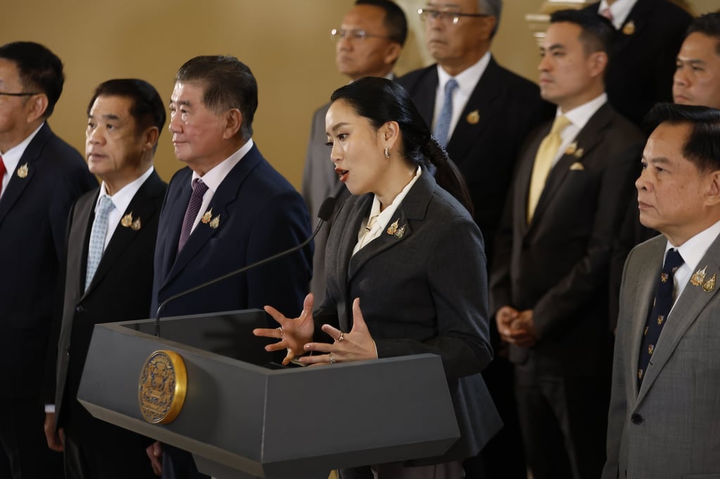 Paetongtarn Shinawatra (centre) speaks at a news conference on Friday to address her removal from office. Photo: EPA Paetongtarn Shinawatra (centre) speaks at a news conference on Friday to address her removal from office. Photo: EPA