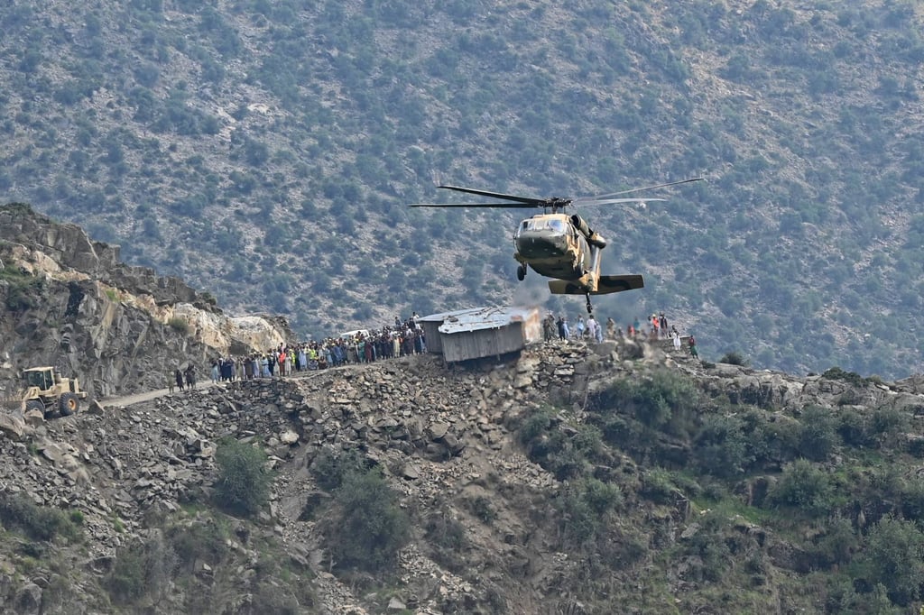 A military helicopter airlifts injured Afghans from a village in Nurgal district, Kunar province. Photo: AFP A military helicopter airlifts injured Afghans from a village in Nurgal district, Kunar province. Photo: AFP