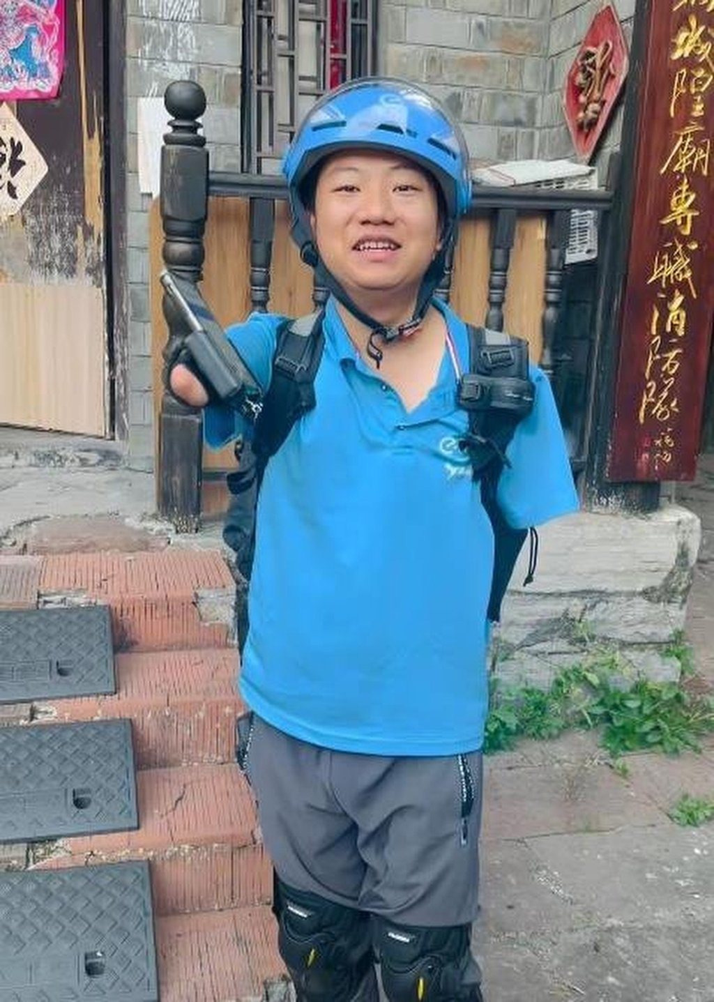 Li Xiangyang, who lost both his arms in a childhood accident, says there is no point in dwelling on the past. Photo: Handout Li Xiangyang, who lost both his arms in a childhood accident, says there is no point in dwelling on the past. Photo: Handout