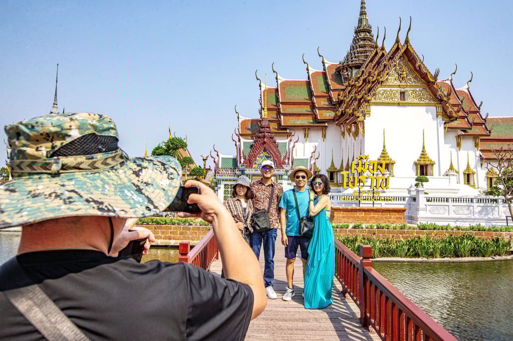 Chinese tourists pose for a group photo at Ancient Siam in Samut Prakan, Thailand, in March 2024. In July, Chinese arrivals to Thailand plunged 39 per cent year-on-year. Photo: Xinhua Chinese tourists pose for a group photo at Ancient Siam in Samut Prakan, Thailand, in March 2024. In July, Chinese arrivals to Thailand plunged 39 per cent year-on-year. Photo: Xinhua