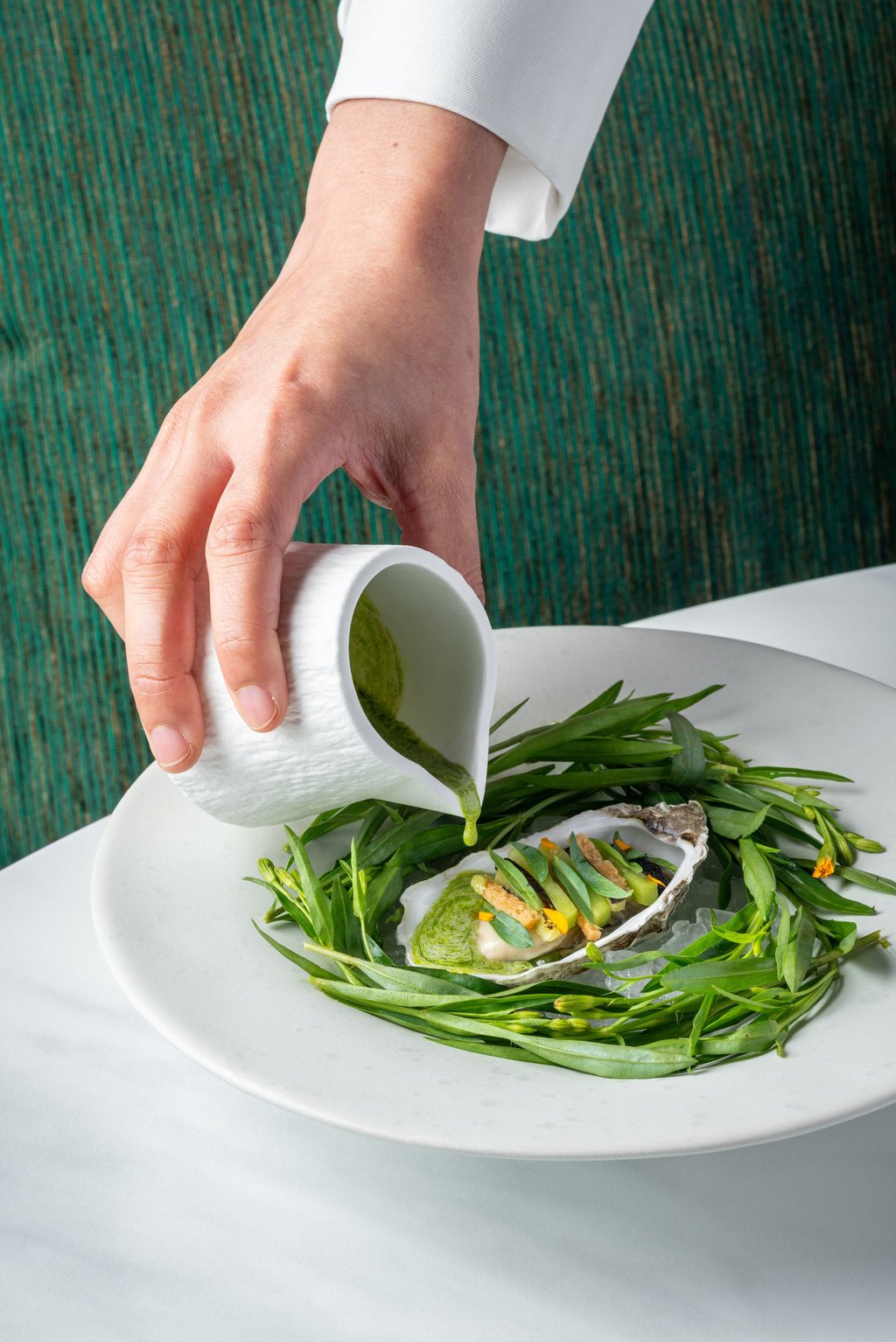 Ostra Regal oyster with tarragon and kiwi, at Duet by David Toutain, in the Ritz-Carlton, Bangkok, the venue for Marriott’s Luxury Dining Series finale. Photo: Handout