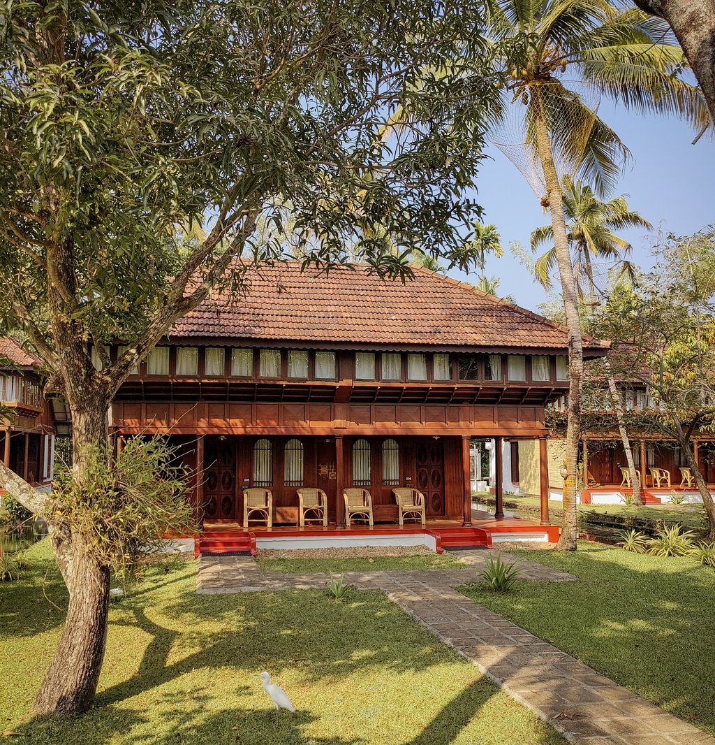 Traditional wooden houses that were transported and set up as guest villas at Coconut Lagoon in Kumarakom. Photo: Kalpana Sunder