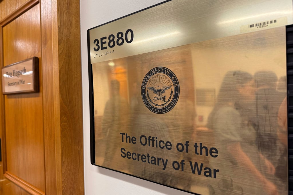 A new sign hangs at the Pentagon after the US Department of Defence was renamed the Department of War on Friday. Photo: AP A new sign hangs at the Pentagon after the US Department of Defence was renamed the Department of War on Friday. Photo: AP