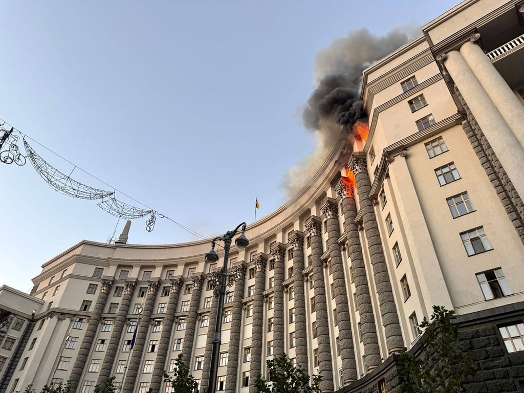 A Ukrainian government building in Kyiv on fire on Sunday after an overnight attack by Russia. Photo: AFP/Ukrainian State Emergency Service A Ukrainian government building in Kyiv on fire on Sunday after an overnight attack by Russia. Photo: AFP/Ukrainian State Emergency Service