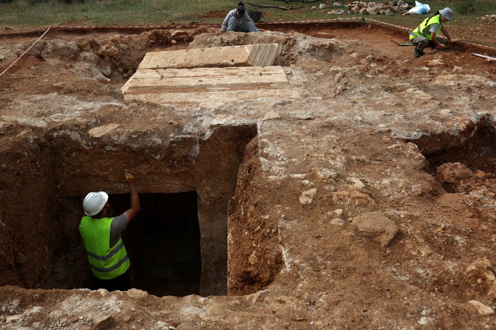 Archaeologists work on Albania’s first discovered monumental tomb in Strikcan, Albania, on Thursday. Local authorities in Albania are already planning to develop the site into a tourist attraction. Photo: Reuters Archaeologists work on Albania’s first discovered monumental tomb in Strikcan, Albania, on Thursday. Local authorities in Albania are already planning to develop the site into a tourist attraction. Photo: Reuters