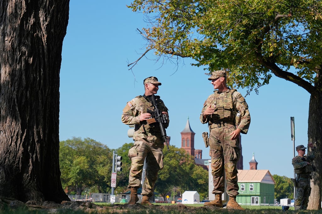 Members of the South Carolina National Guard patrol along the National Mall, in Washington last week. Photo: AP