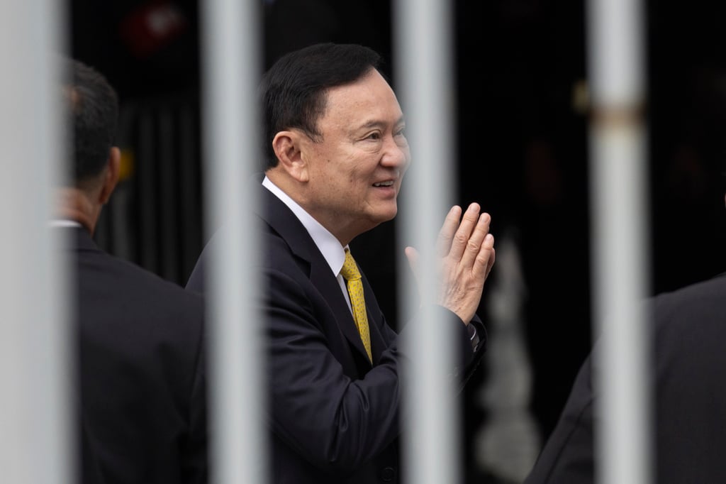 Thaksin Shinawatra arrives at the Supreme Court in Bangkok on Tuesday. Photo: AP Thaksin Shinawatra arrives at the Supreme Court in Bangkok on Tuesday. Photo: AP