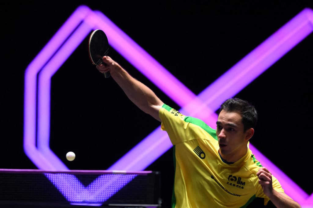 Hugo Calderano hits a return against An Jae-hyun in Macau. Photo: Xinhua