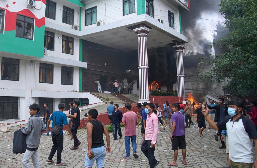 Protesters vandalise the Nepalese Congress Party central office during protests against the social media ban and corruption in Kathmandu on Tuesday. Photo: AP