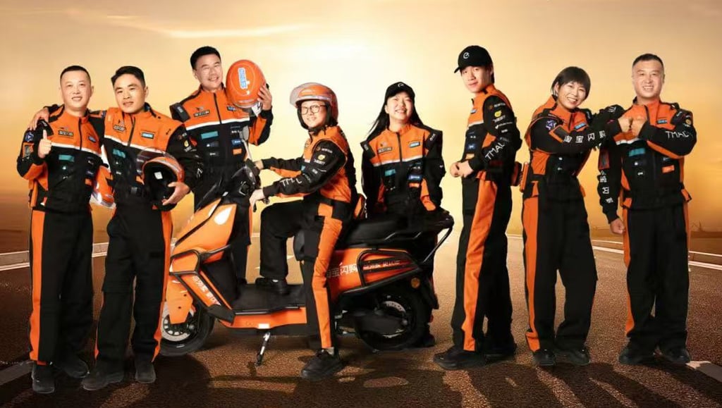Alibaba Group Holding is rolling out new uniforms, which resemble Formula One racing suits, for its delivery workers. Photo: Alibaba