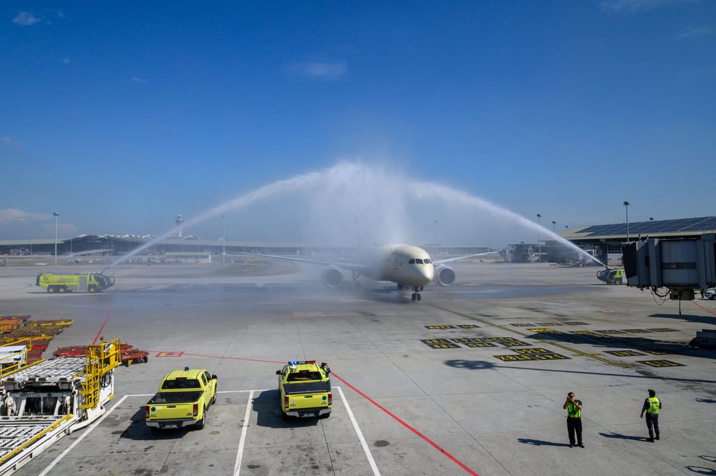A passenger plane is welcomed by water cannon salute at Kuala Lumpur International Airport in Sepang. Malaysia is already the region’s second-largest MRO provider. Photo: Xinhua A passenger plane is welcomed by water cannon salute at Kuala Lumpur International Airport in Sepang. Malaysia is already the region’s second-largest MRO provider. Photo: Xinhua