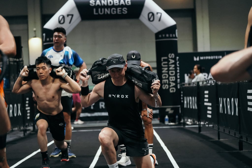 Douglas Bray (centre) competes in the Hyrox challenge in Hong Kong in July. Completing the gruelling race left the cancer survivor feeling “fully recovered” three years after his life-changing surgery. Photo: Douglas Bray