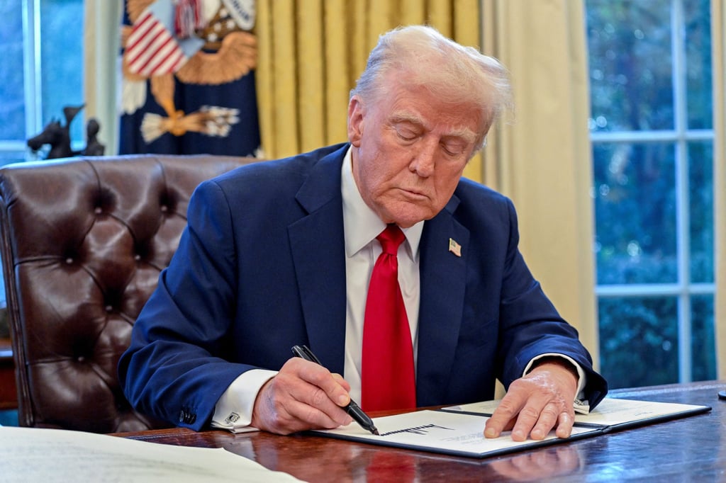 US President Donald Trump signs an executive order in the Oval Office of the White House on January 30. A West Kowloon senior executive at the top of the pay scale takes home over HK$6 million, more than a US president. Photo: TNS US President Donald Trump signs an executive order in the Oval Office of the White House on January 30. A West Kowloon senior executive at the top of the pay scale takes home over HK$6 million, more than a US president. Photo: TNS