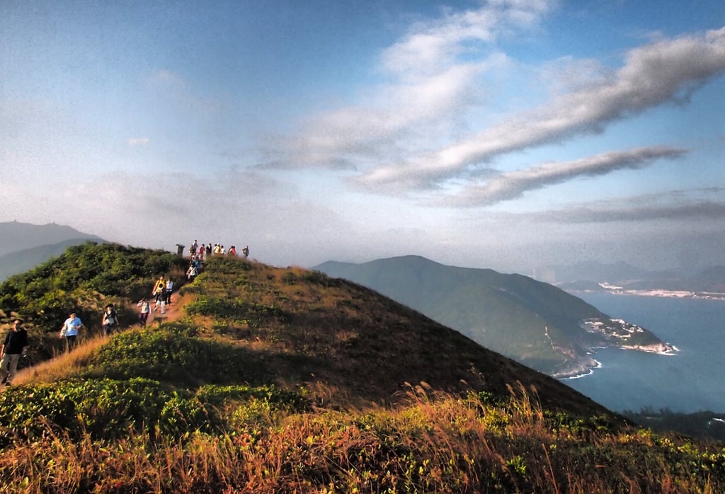 Hikers walk along Hong Kong’s Dragon’s Back trail, in Shek O. Photo: Martin Williams Hikers walk along Hong Kong’s Dragon’s Back trail, in Shek O. Photo: Martin Williams