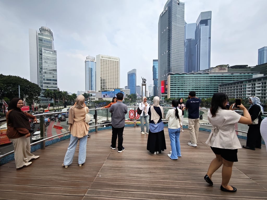 Residents stand on a skydeck at a main roundabout in Jakarta, Indonesia, in August. Inflation stood at 2.31 per cent in August. Photo: EPA
