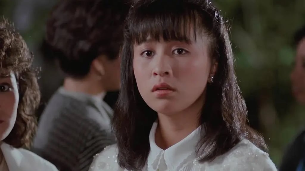 Lau in a still from Rich and Famous (1987).