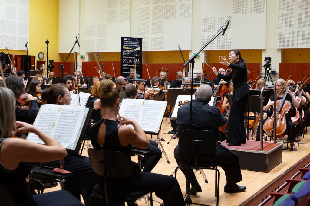 Ip conducts at the IFFCC 2025 finals in Szeged, Hungary. Photo: International Ferenc Fricsay Conducting Competition Ip conducts at the IFFCC 2025 finals in Szeged, Hungary. Photo: International Ferenc Fricsay Conducting Competition