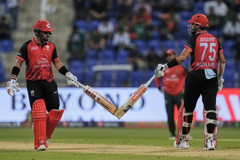 Hong Kong’s Nizakat Khan (right) and Zeeshan Ali during the Asia Cup match against Bangladesh. Photo: AP Hong Kong’s Nizakat Khan (right) and Zeeshan Ali during the Asia Cup match against Bangladesh. Photo: AP