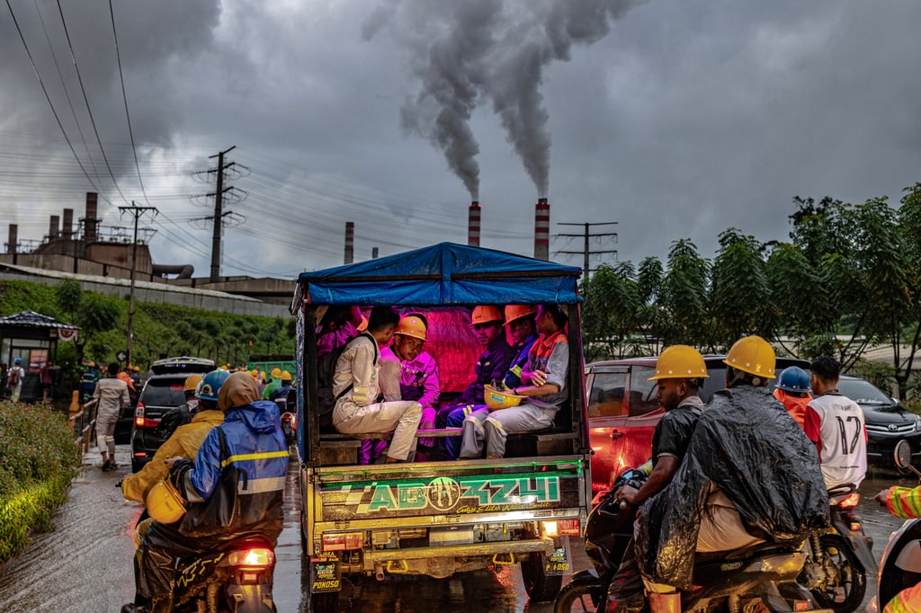 Workers ride towards a nickel smelting and processing plant in Weda, Halmahera, Indonesia, on August 12. Photo: Mas Agung Wilis Yudha Baskoro, for China Global South Project