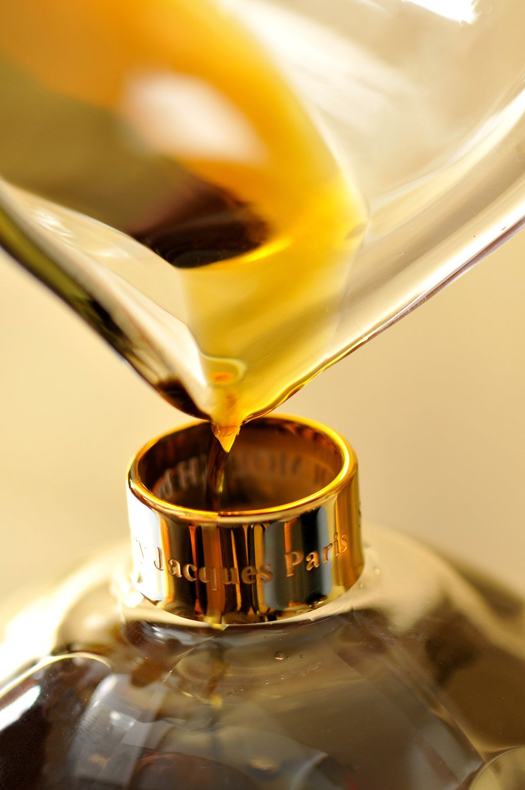 Pouring a Henry Jacques fragrance into a vessel. Photo: Handout