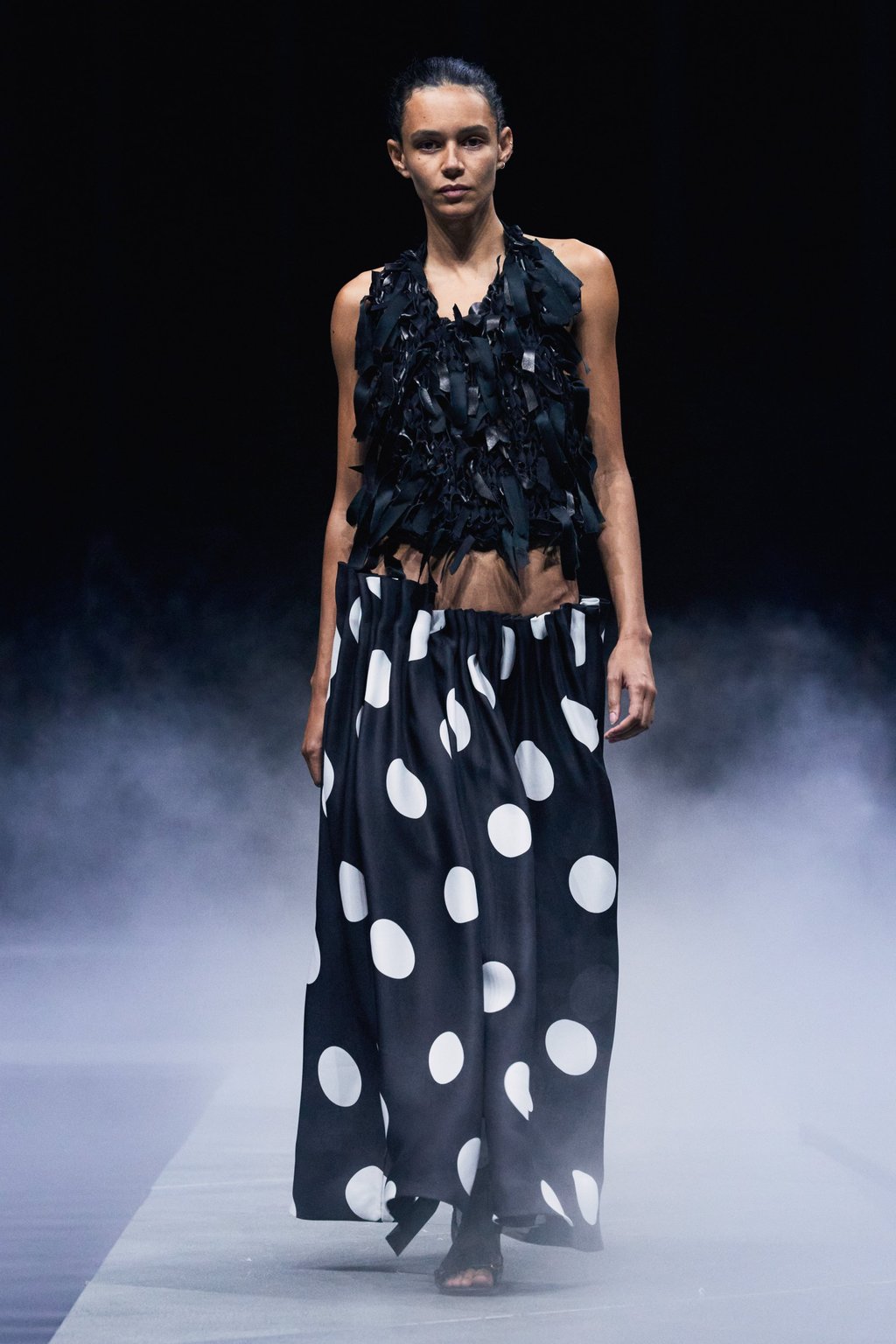 The Khaite show closed with a fringed top paired with a polka dot skirt. Photo: Handout The Khaite show closed with a fringed top paired with a polka dot skirt. Photo: Handout