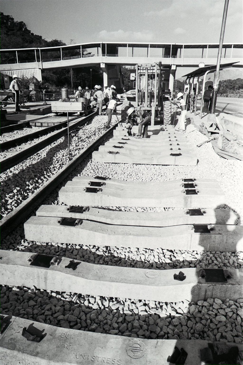 The first section of rail track is laid in Tuen Mun, in 1986. Photo: SCMP Archives