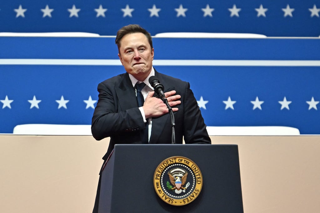 Donald Trump supporter Elon Musk gestures as he speaks during the president’s inaugural parade in Washington in January. Photo: via TNS Donald Trump supporter Elon Musk gestures as he speaks during the president’s inaugural parade in Washington in January. Photo: via TNS