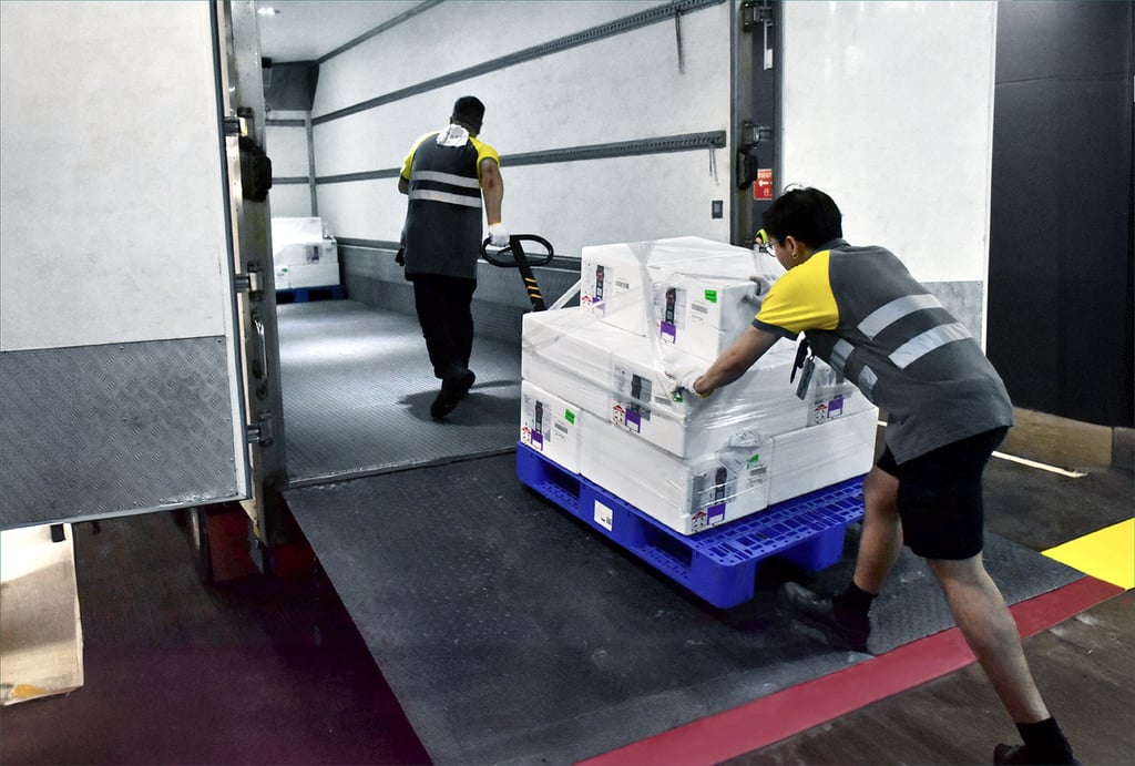 A shipment is loaded onto a refrigerated truck set to head over the Hong Kong-Zhuhai-Macau Bridge. Photo: Handout