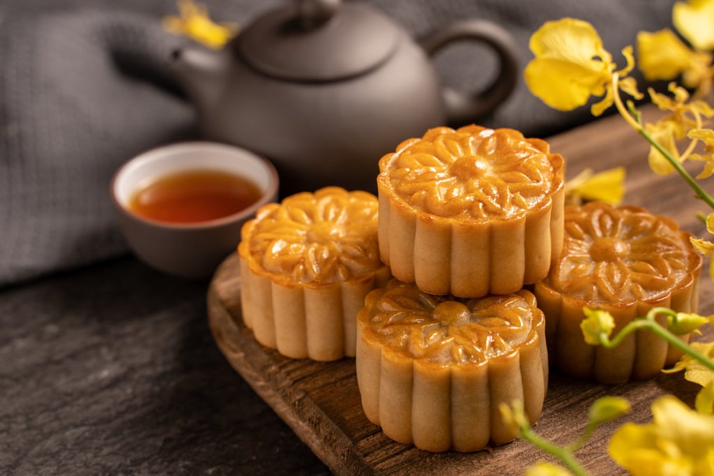 Mooncakes are filled with sweet or savoury fillings and often have a salted duck egg yolk in the middle. Photo: Shutterstock Mooncakes are filled with sweet or savoury fillings and often have a salted duck egg yolk in the middle. Photo: Shutterstock