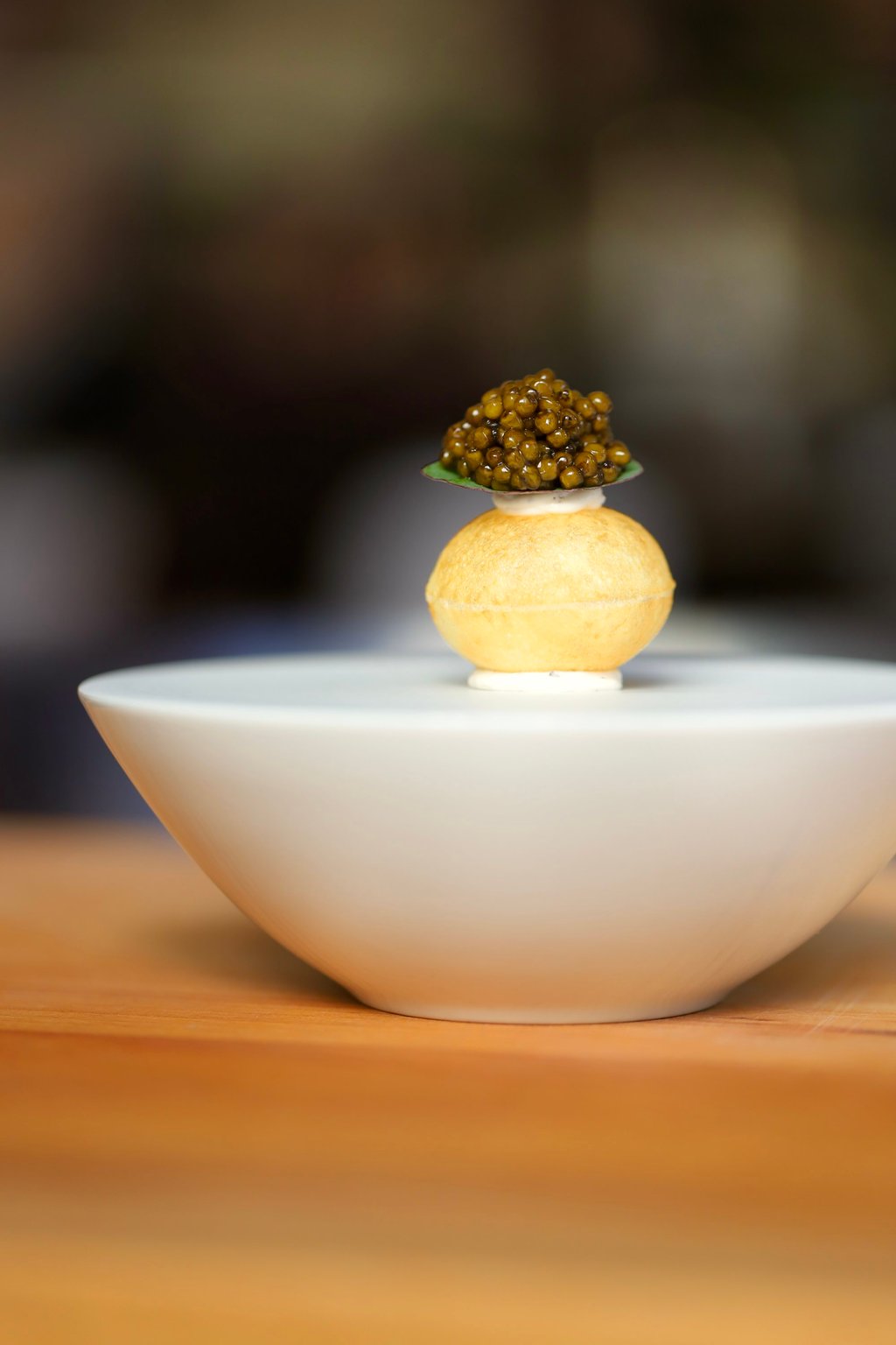 The pomme soufflée au caviar is part of the collaboration between chefs Uwe Opocensky and Frédéric Chabbert at Restaurant Petrus. Photo: Handout The pomme soufflée au caviar is part of the collaboration between chefs Uwe Opocensky and Frédéric Chabbert at Restaurant Petrus. Photo: Handout