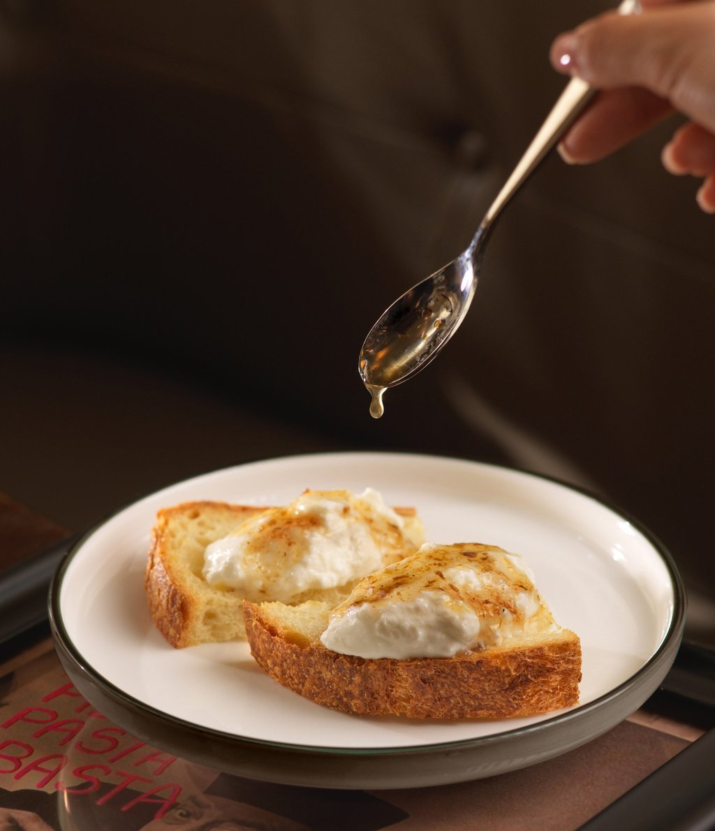 Burrata and truffle honey bruschetta at La Volta in Hong Kong. Photo: courtesy La Volta