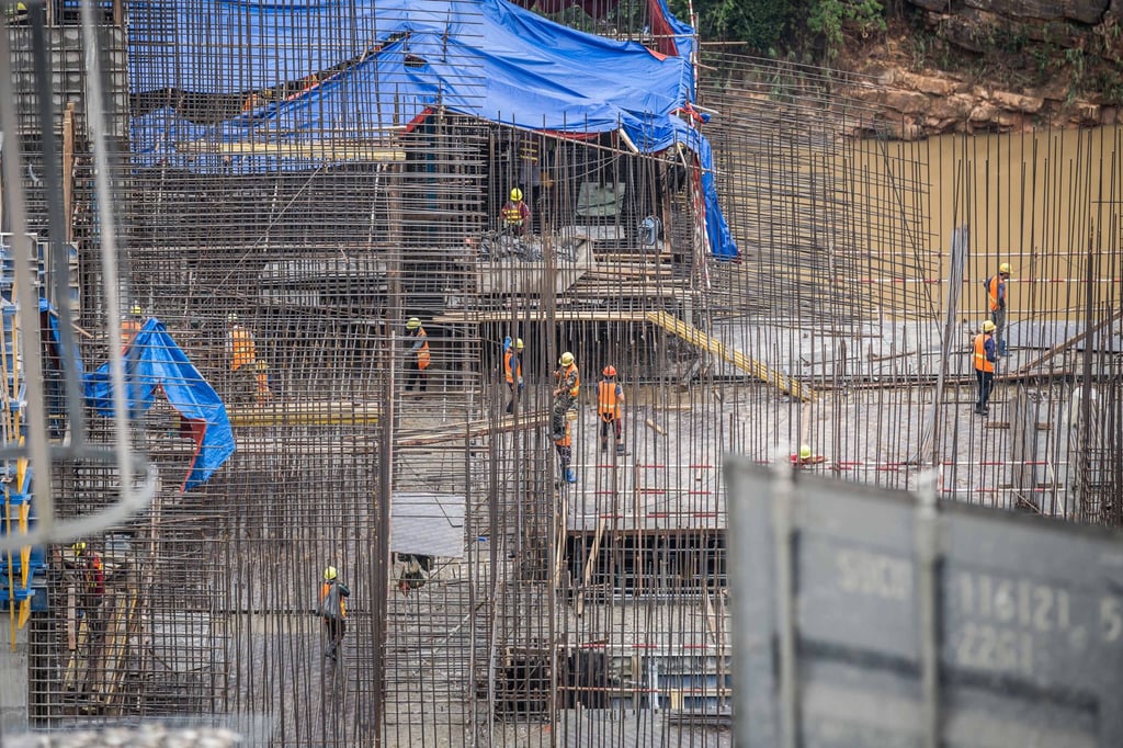 Workers at the construction site of a hydropower project in Borikhamxay province, Laos, in 2020. Photo: Xinhua